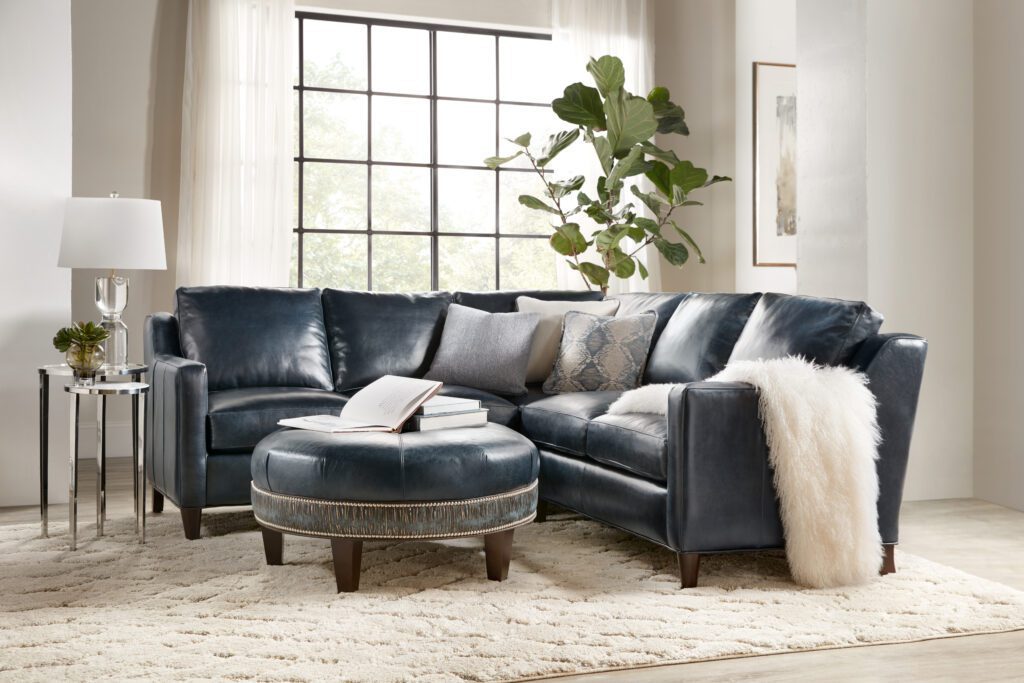 a navy sectional sofa in a living room