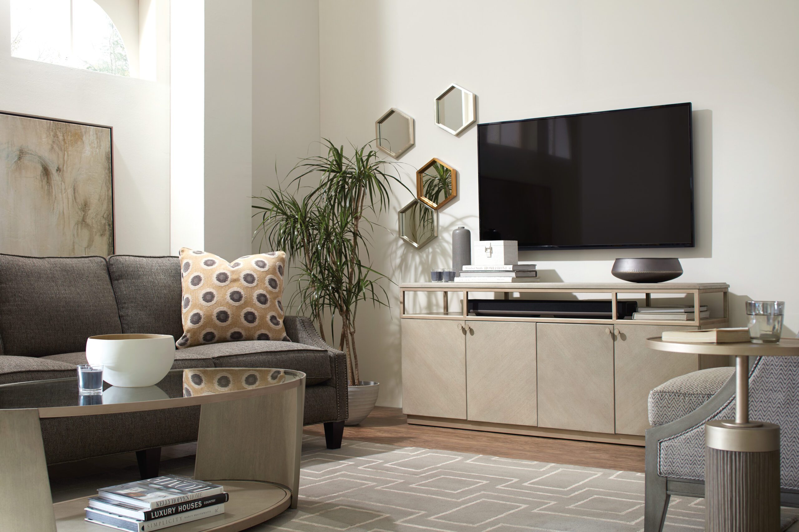 a beige entertainment center in a living room