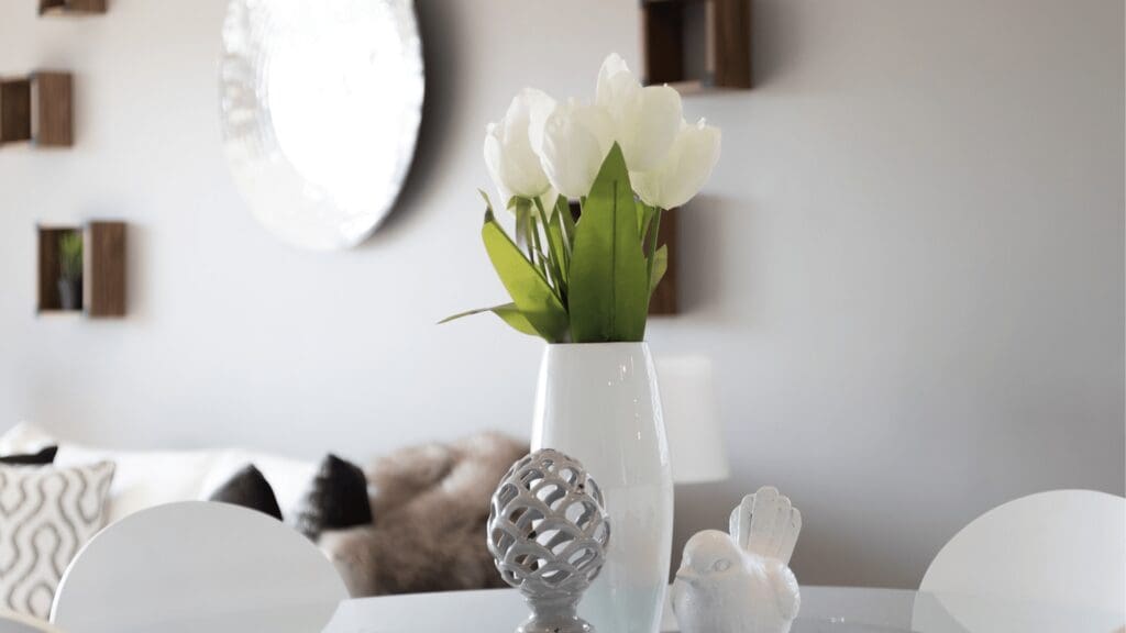an image of white tulips in a vase 